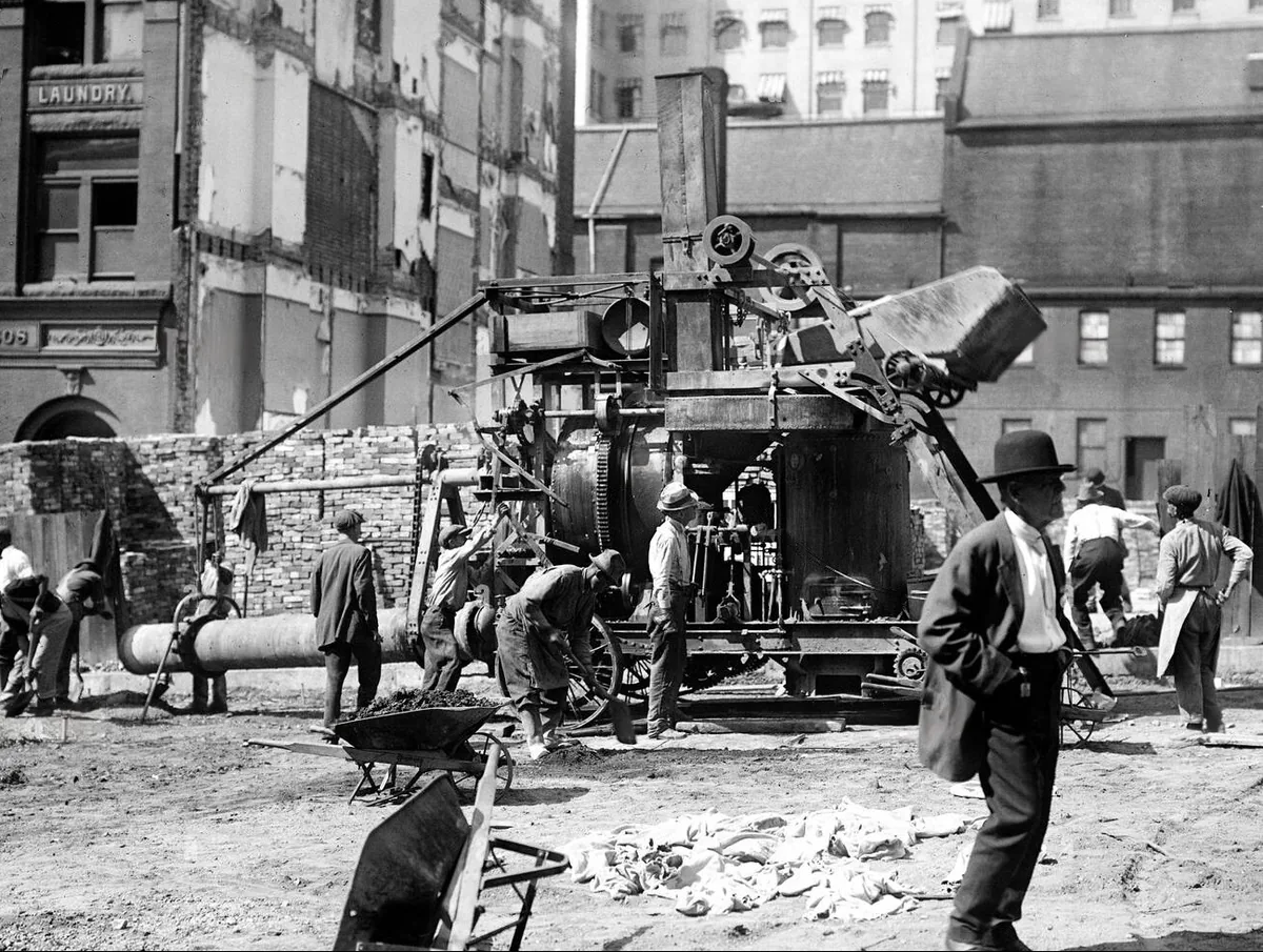 Early 1900s construction equipment circa 1916-1918 — transition from steam to gas-powered machinery